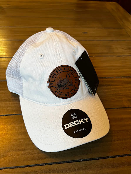 White low profile trucker hat with dove patch